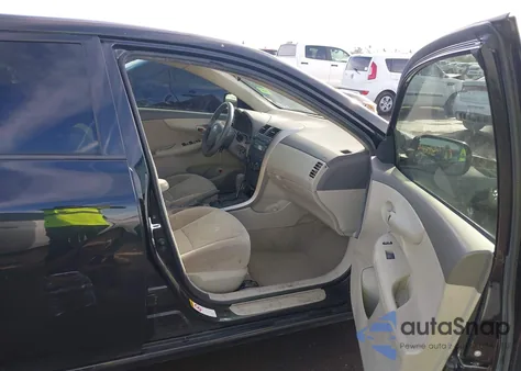 2009 Toyota Corolla Le from USA, damaged, VIN JTDBL40E699051143